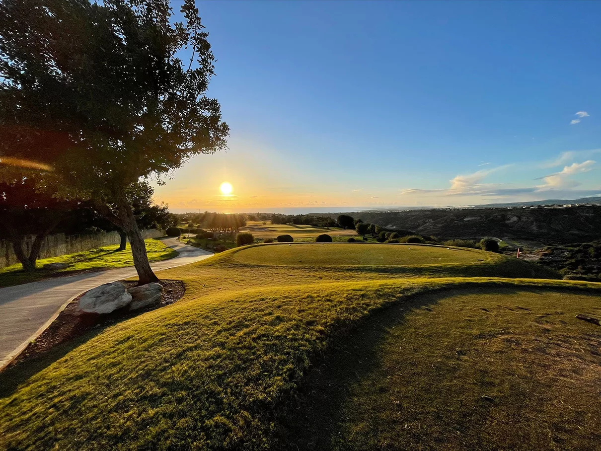 View of sunset from the top of the 15th hole on Aphrodite Hills PGA National Golf Course, Cyprus.