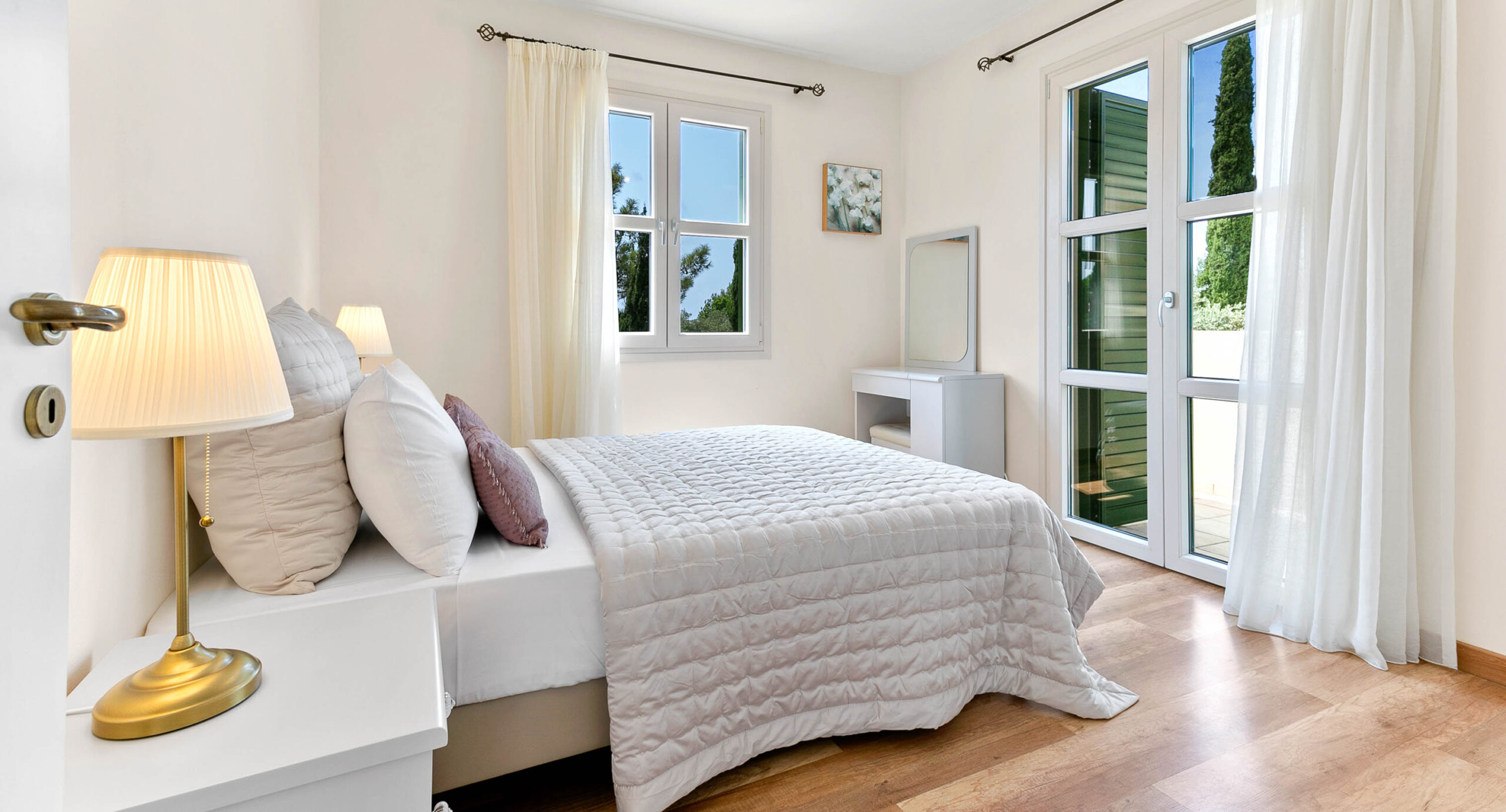 Photo of Junior Villa R1 on Aphrodite Hills - showing the master bedroom with balcony