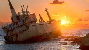 Photograph of sunset behind a shipwreck in Paphos, Cyprus